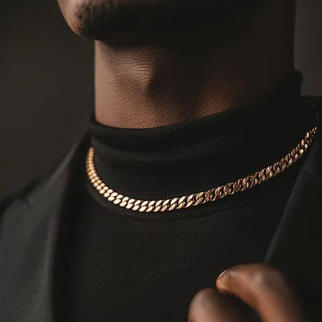Men’s gold curb chain necklace on black turtleneck, minimalist luxury jewelry styling – AEXON