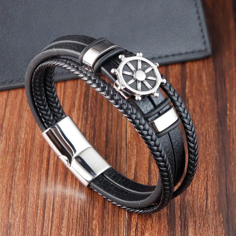 black leather bracelet with sailing ship wheel design for men