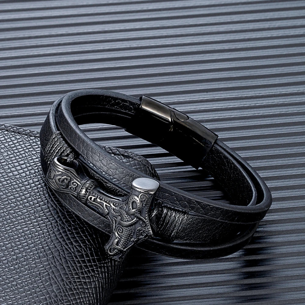 viking thor hammer pendant bracelet with braided leather band