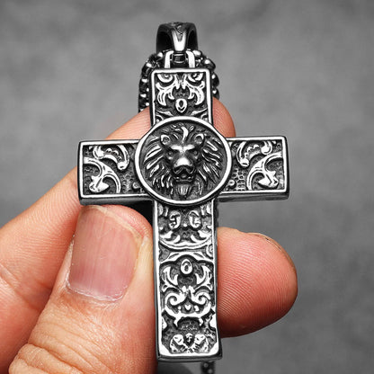 Close up of stainless steel lion cross pendant necklace