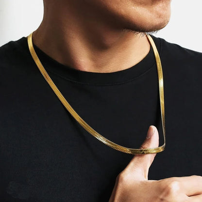 Flat gold snake chain necklace for men styled with black shirt
