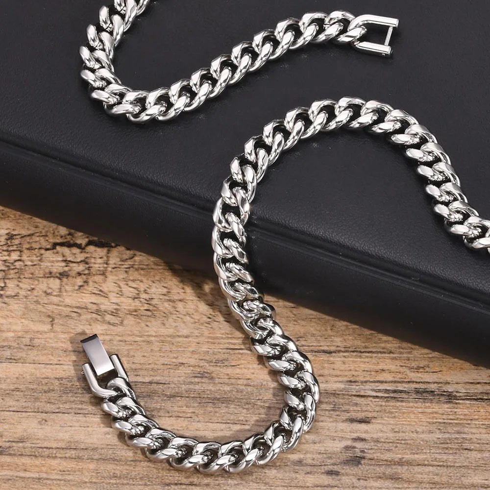 Close-up of stainless steel Cuban curb chain necklace for men with reflective polished links