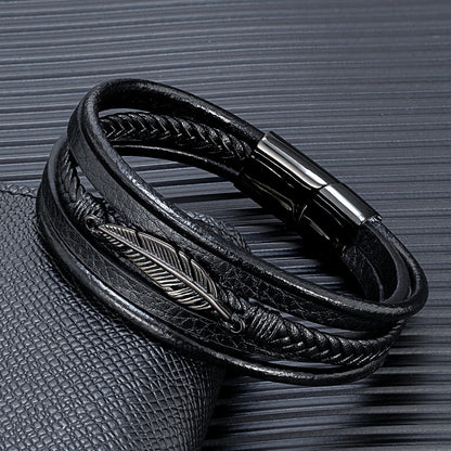 men's braided leather bracelet with black feather centerpiece