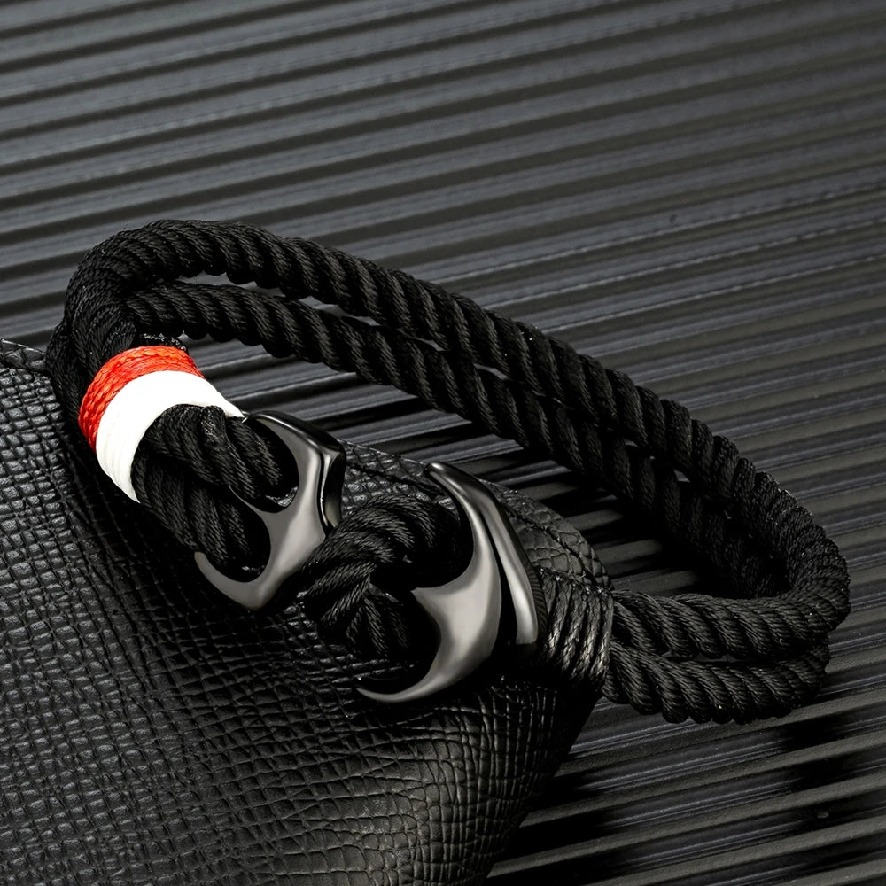 Men’s nautical anchor rope bracelet with black double strand marine cord and stainless steel anchor clasp.