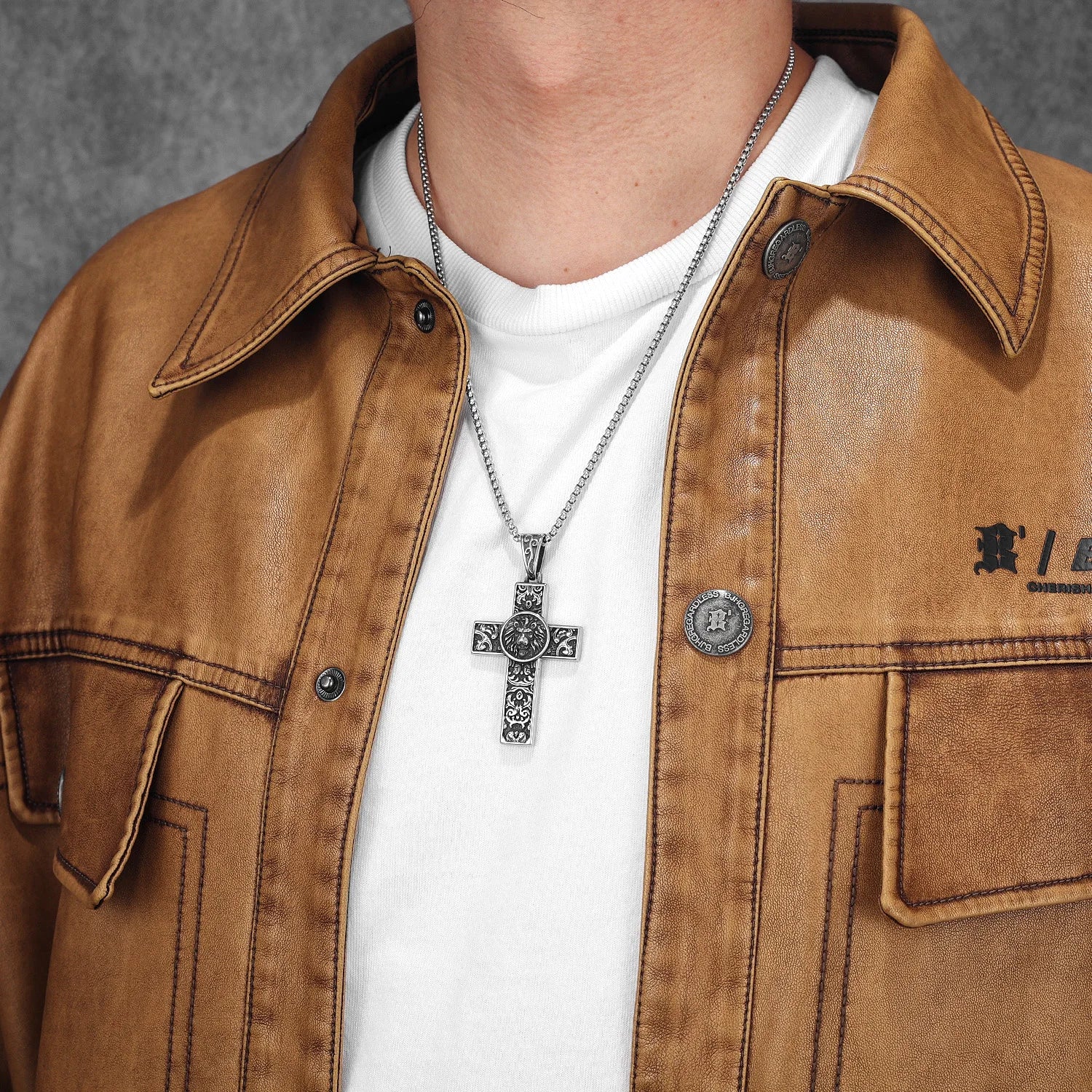 Men’s faith cross necklace with lion design and vintage finish