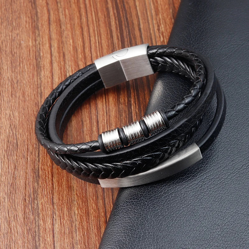 men's layered leather bracelet with silver metal accents and clasp