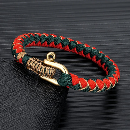 men's woven red and green paracord survival bracelet with gold metal shackle