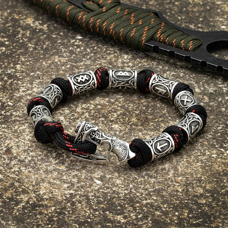 Nordic warrior bracelet with engraved rune beads and Viking axe clasp