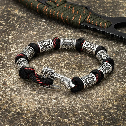 Nordic warrior bracelet with engraved rune beads and Viking axe clasp