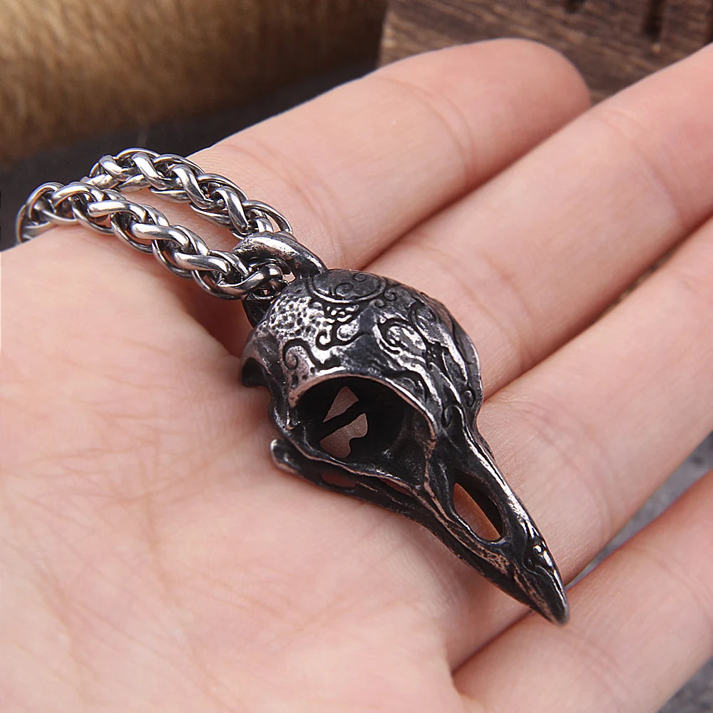 Close up of stainless steel raven skull pendant necklace