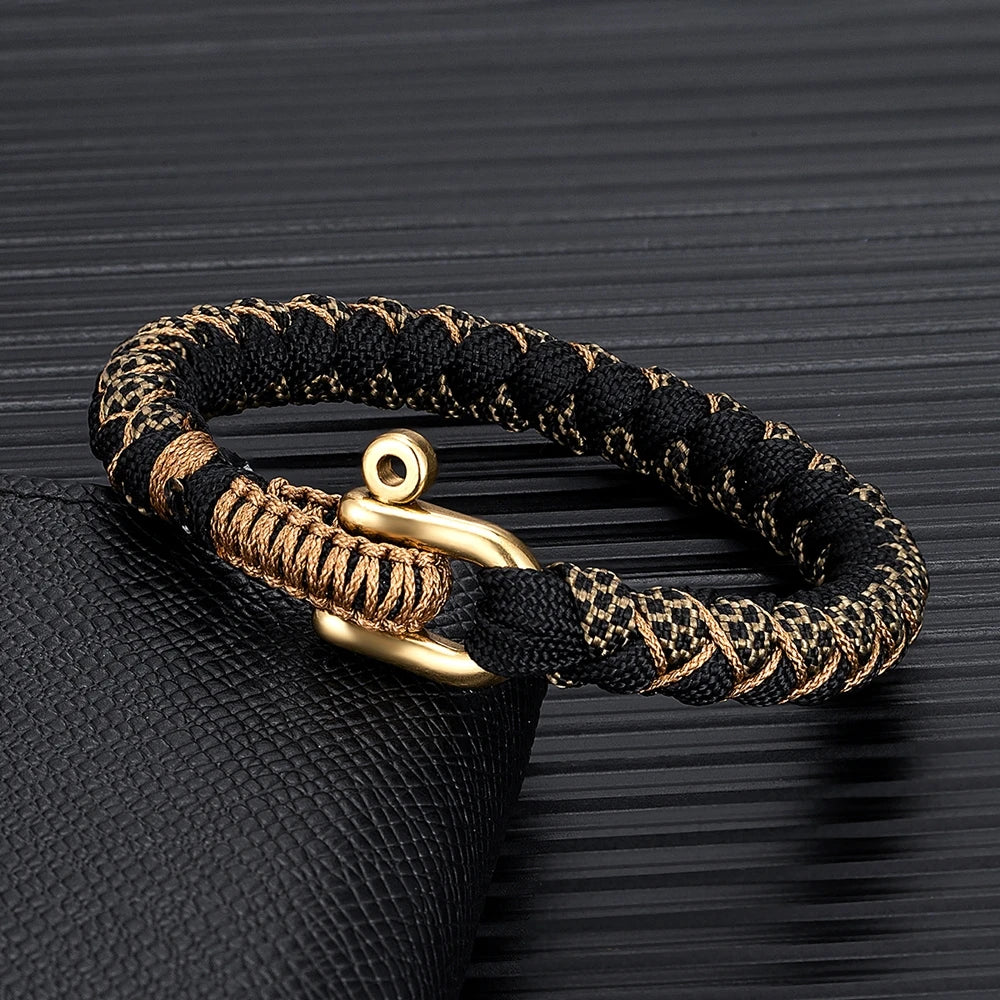 men's survival black and gold rope bracelet with brass shackle closure