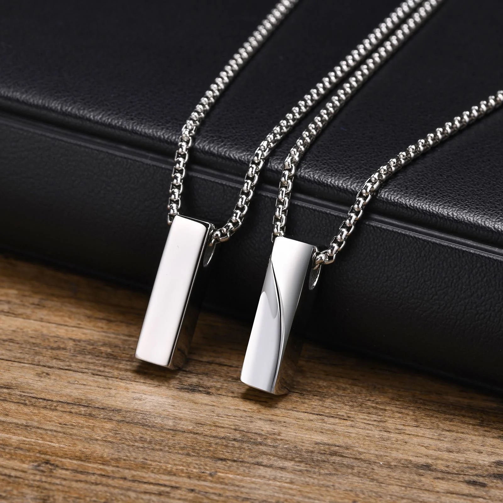 Close up of modern geometric bar pendant necklace