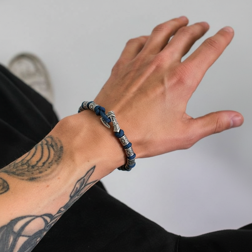 Viking rune bracelet with adjustable cord and Norse rune beads on wrist
